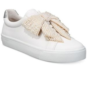 White sneakers with beaded bow